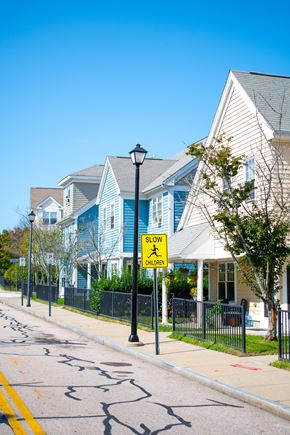 Newport apartment for rent - a row of blue and white houses on the side of a street