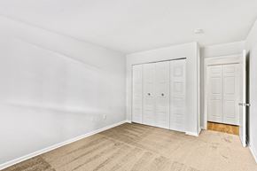 Reston apartment for rent - bedroom with closet and carpeted floor