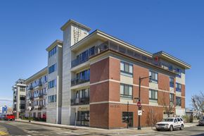 Boston apartment for rent - a new apartment building on the corner of a city street