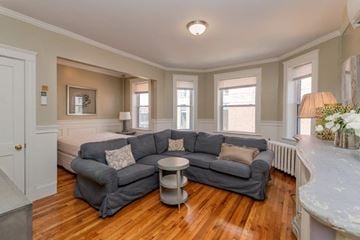 Boston apartment for rent - a living room with a couch and a table