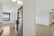 King Of Prussia apartment for rent - A modern kitchen with stainless steel appliances and wooden flooring.