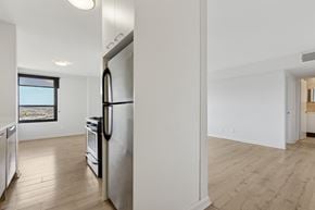 King Of Prussia apartment for rent - A modern kitchen with stainless steel appliances and wooden flooring.