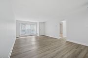 Philadelphia apartment for rent - A room with wooden flooring and white walls.