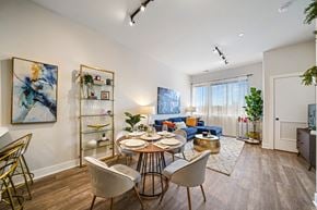 Lansdale apartment for rent - A dining room with a round table and chairs.