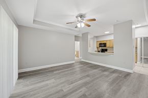 Philadelphia apartment for rent - A spacious room with a ceiling fan and a wooden cabinet.