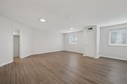 Philadelphia apartment for rent - A room with wooden flooring and white walls.