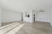 Philadelphia apartment for rent - A spacious room with sunlight pouring in through the balcony door.
