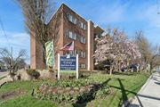 Philadelphia apartment for rent - A brick building with a sign that says Haverford Court Apartments Homes.