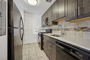Philadelphia apartment for rent - A kitchen with a refrigerator, oven, and sink.