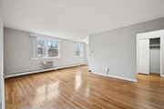 Philadelphia apartment for rent - A room with wooden floors and white walls.