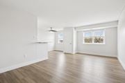 Landsdale apartment for rent - A room with a ceiling fan and a window with blinds.