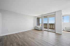 Wyncote apartment for rent - A room with a sliding glass door and a window.