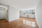 Philadelphia apartment for rent - A room with wooden floors and white walls.
