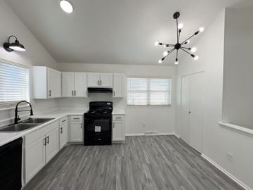 Blue Springs apartment for rent - the preserve at ballantyne commons apartment kitchen and living room