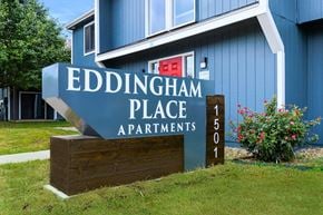Lawrence apartment for rent - a blue building with a sign that says eddingham place apartments