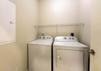 A washer and dryer in a room