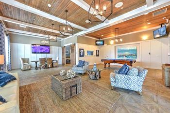 A living room filled with furniture and a flat screen tv