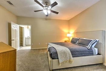 Spacious bedroom with ceiling fan