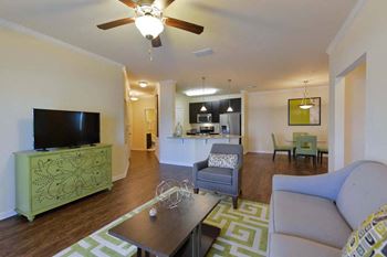 A living room with a couch and a tv