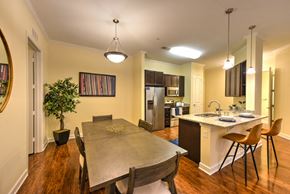 Jacksonville apartment for rent - A dining room with a wooden table and chairs at Alaqua, Florida, 32258