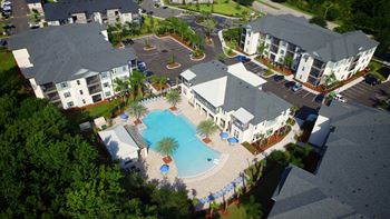 Aerial view of a resort style swimming pool 