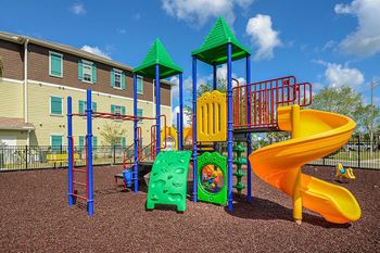 A playground at the hampton center apartments in hampton va