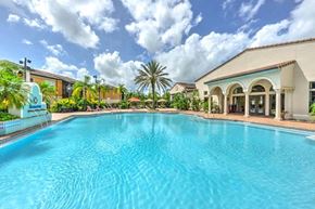 Jacksonville apartment for rent - a large swimming pool with a building in the background  at Hacienda Club, Jacksonville, FL