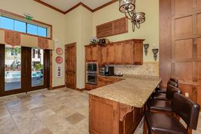 Jacksonville apartment for rent - a kitchen with a counter top next to a doorway  at Hacienda Club, Jacksonville, FL, 32256