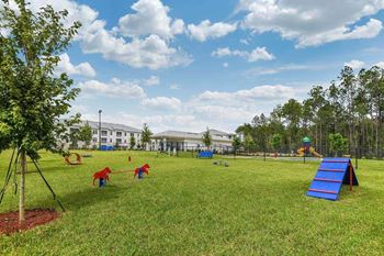 A playground in front of a large building
