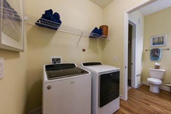 A laundry room with a washer and dryer