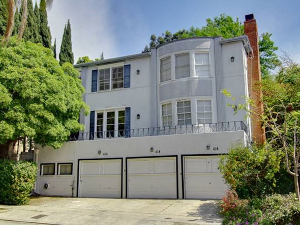Los Angeles apartment for rent - the exterior of a white house with garage doors