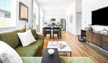 Eugene apartment for rent - a living room with a couch and a table and a tv
