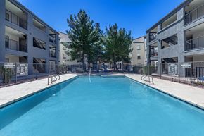 Tucson apartment for rent - A swimming pool in front of apartment buildings.at Icon on Midvale, Tucson Arizona