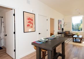 Gresham apartment for rent - Arts Plaza Gresham Oregon Apartments A dining room with a table set for two.
