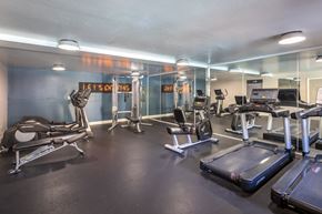 Pleasant Hill apartment for rent - A gym with treadmills, exercise bikes, and other equipment.