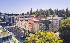 Bellevue apartment for rent - an aerial view of a city with buildings and trees