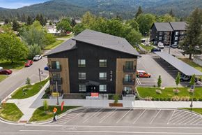 Post Falls apartment for rent - A black building with the number 24 on it.