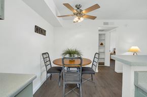 Tucson apartment for rent - A dining room with a table and chairs.