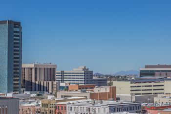 A cityscape with a blue sky above