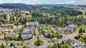 Happy Valley apartment for rent - A bird's eye view of a residential area with a large building in the center.