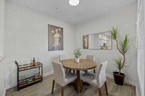Gilbert apartment for rent - A dining room with a round table and chairs.