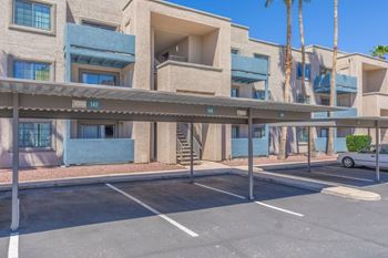 Covered parking spaces with apartment buildings