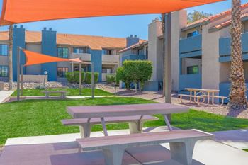 Outdoor picnic area with shade sails