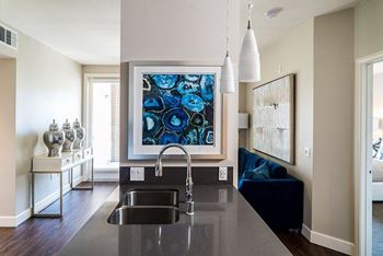 Breakfast bar with overhead pendant lighting