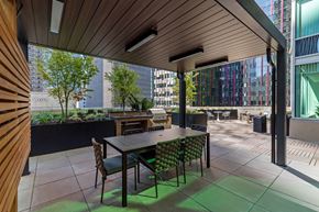 Seattle apartment for rent - a dining area with a table and chairs on a patio