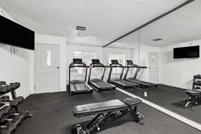 Kennewick apartment for rent - Fitness center with treadmills and weight equipment at The Q Apartments, Washington, 99336