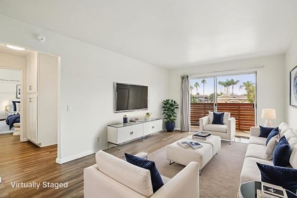 Huntington Beach apartment for rent - A living room with a white couch and a television.