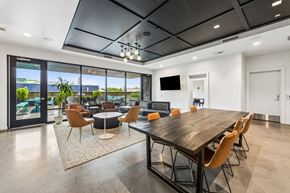 Portland apartment for rent - Community lounge leading to outdoor terrace at Grand Belmont Apartments in Central Eastside Portland, Oregon.