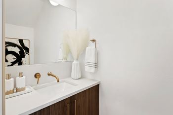 Floating bathroom vanities with wall mounted faucets