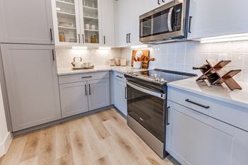 Shaker-style kitchen cabinets with 42in. Uppers